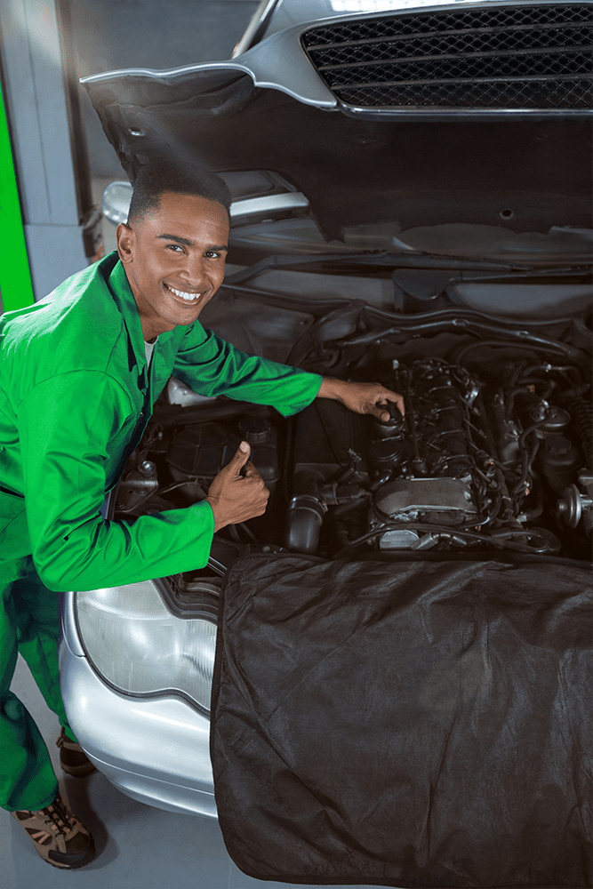 Mechanic-showing-thumbs-up-while-repairing-car. Png